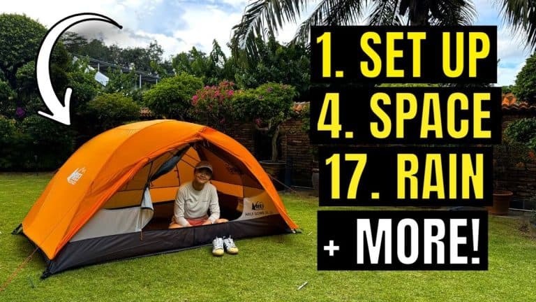 The author testing the REI Half Dome 2 Plus Tent.
